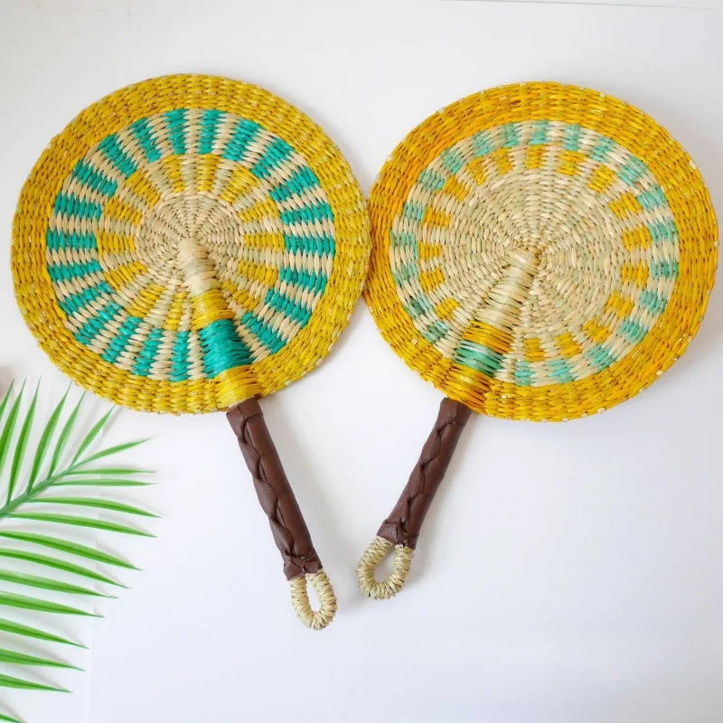 2025 New Hot-selling Seagrass Woven Straw Fan Wall Hanging African Element Wind Wall Decoration Daily Summer Hand Crank Pu
